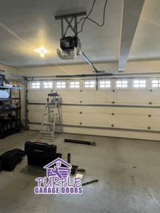 motor with track and a brand new garage door